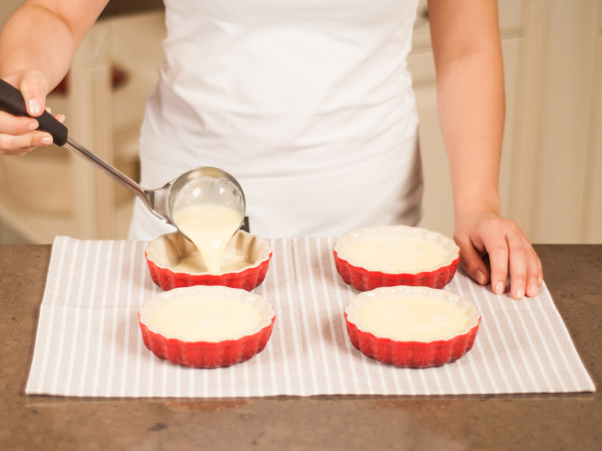 Baked vanilla pudding with hot raspberries