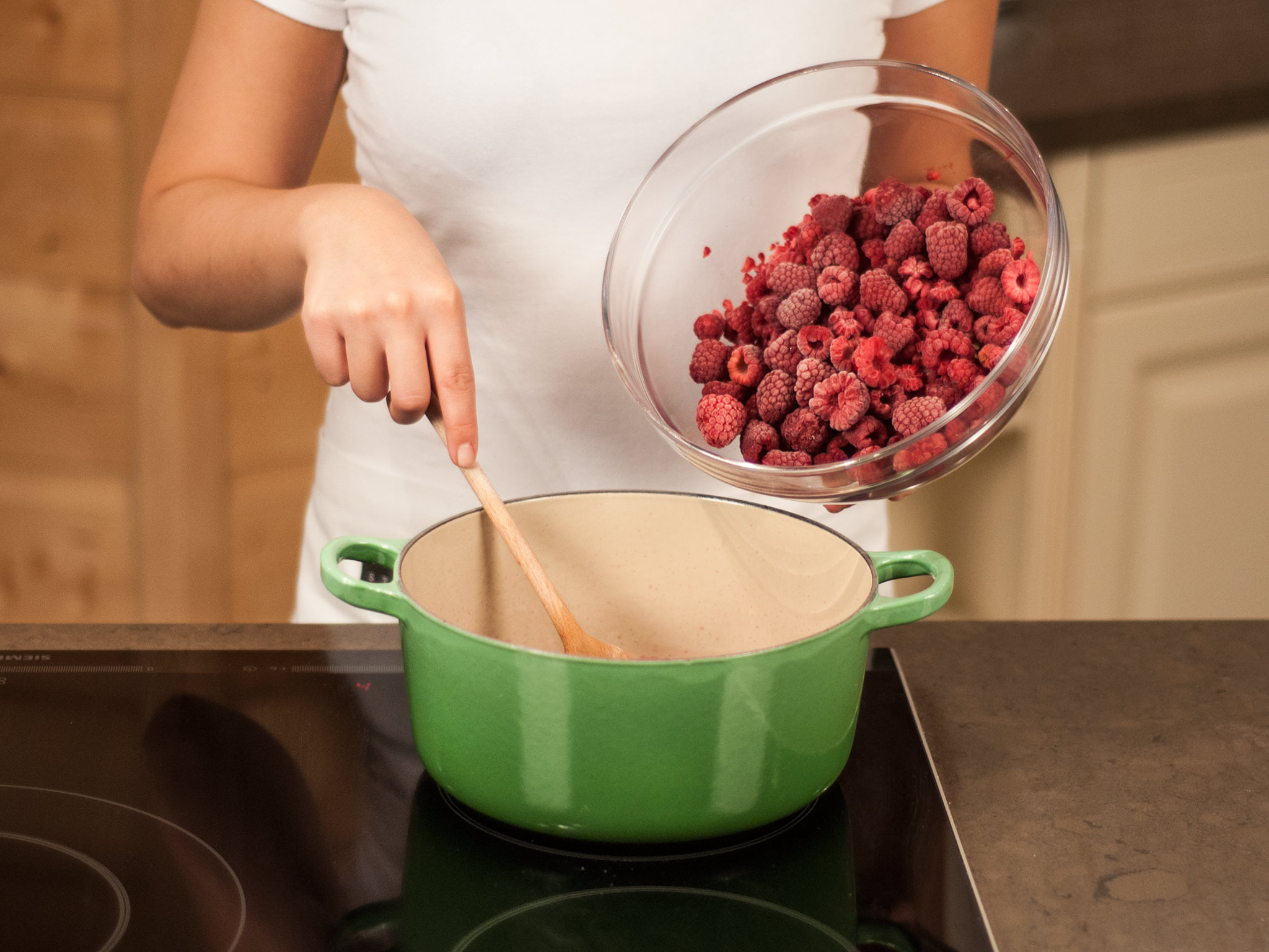 Baked vanilla pudding with hot raspberries