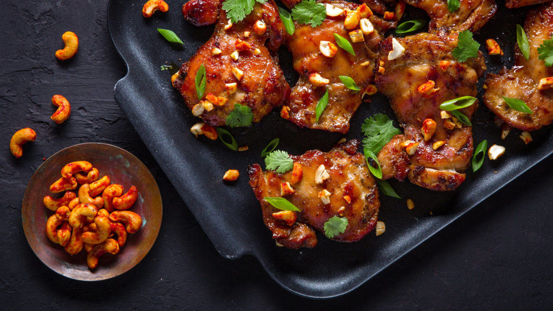 Grilled Soy-Basted Chicken Thighs With Spicy Cashews