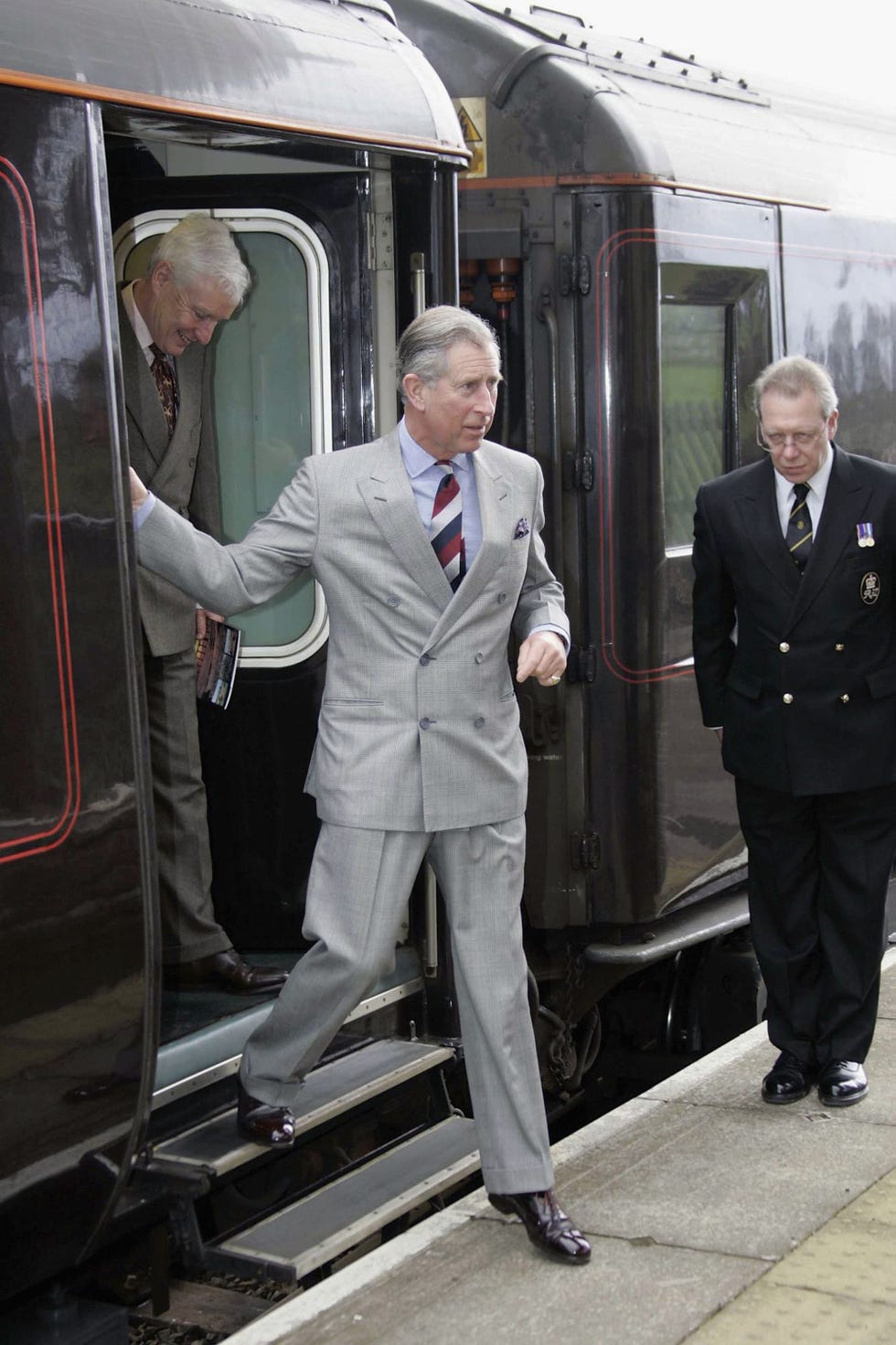 cumbria, england march 22: (no uk sales for 28 days) the prince of wales arrives at kirkby stephens station during a tour on the settle to carlisle line in cumbria on a steam powered royal train pulled by the duchess of sutherland steam locomotive on march 22, 2005, england. (photo by tim graham picture library/rota/getty images)