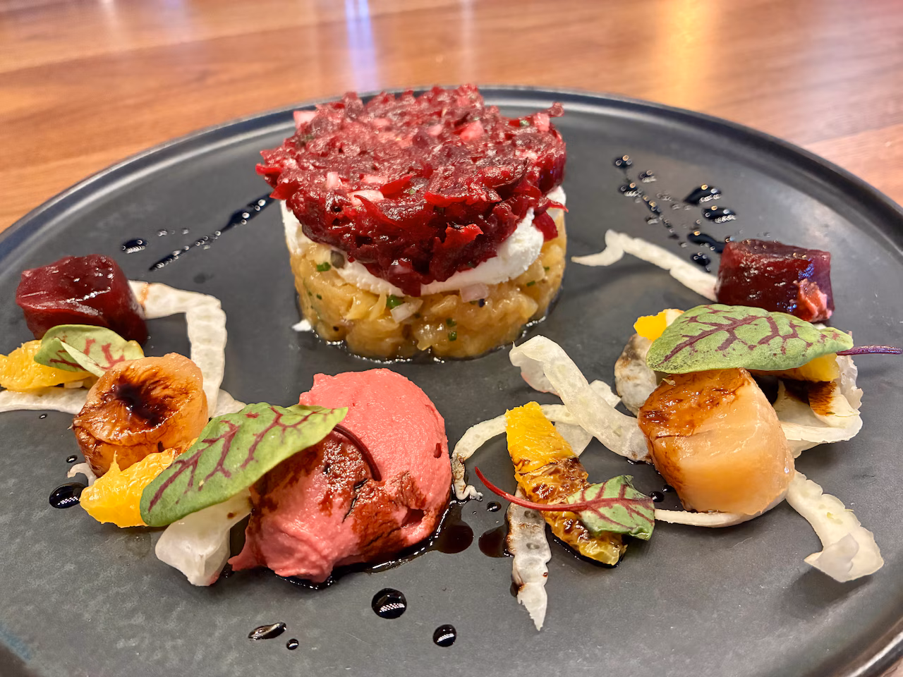 BEET TERRINE - goat cheese mousse, orange, fennel, beet cashew puree, balsamic from Stirling located at 1288 Weathervane Lane, in Akron