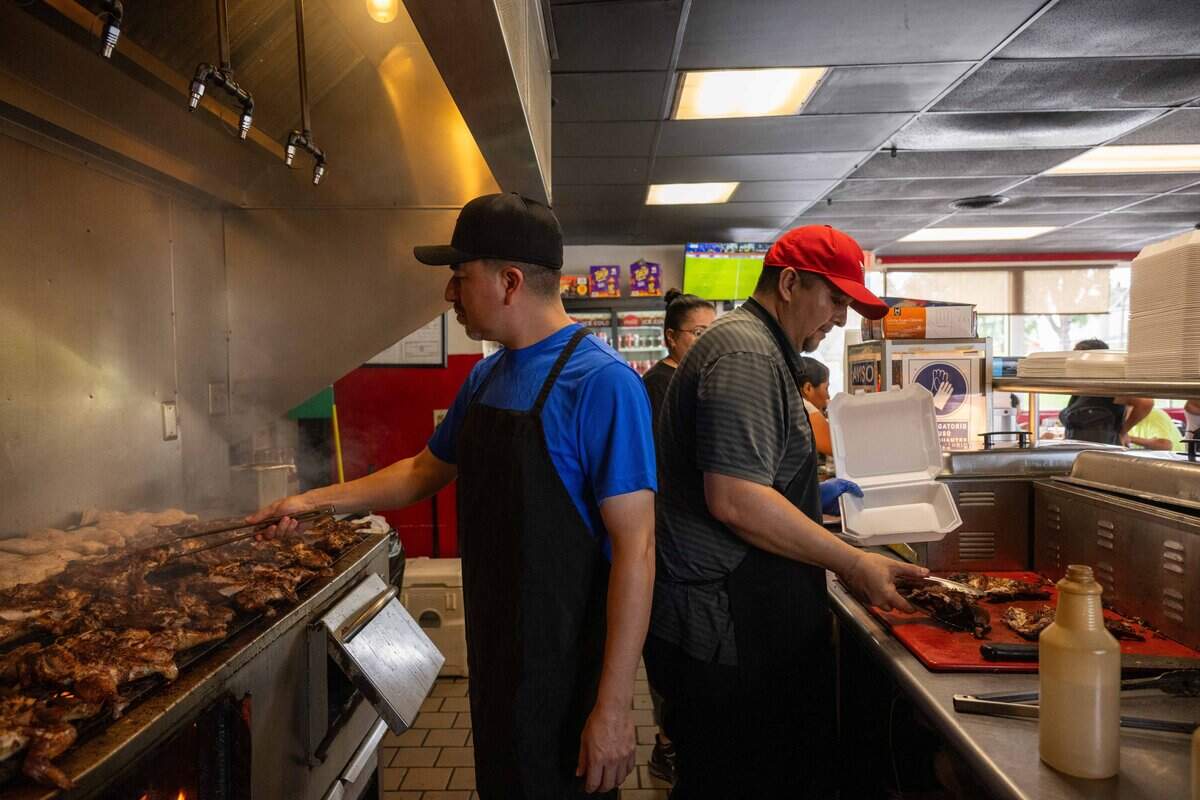 Employees prepare chicken plates at El Pollo Rey, on Tuesday, August 18, 2026, in Kansas City. The Kansas City, Kansas staple was recently named to The New York Times list of the 41 greatest Mexican restaurants in the country.