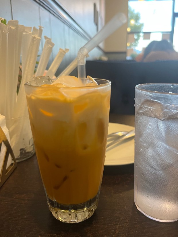 Thai tea from Ann Thai, accompanied by a bendy straw. (Avery Sloan/The Virginian-Pilot)