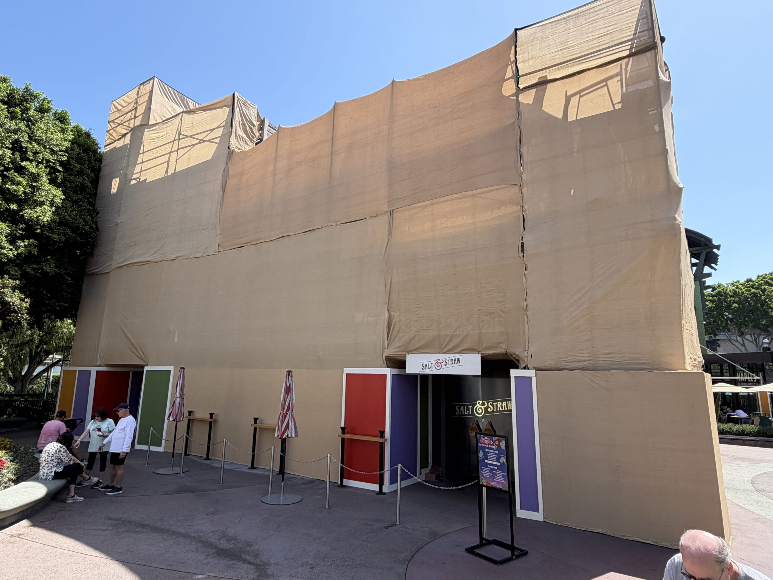 Exterior refurbishment work has now expanded across an entire multi-tenant building in the Downtown Disney District.