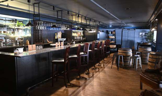 SUR Barrels & Boards occupies the upstairs bar space at Dream Hall in Elgin. (Rick West/Daily Herald)