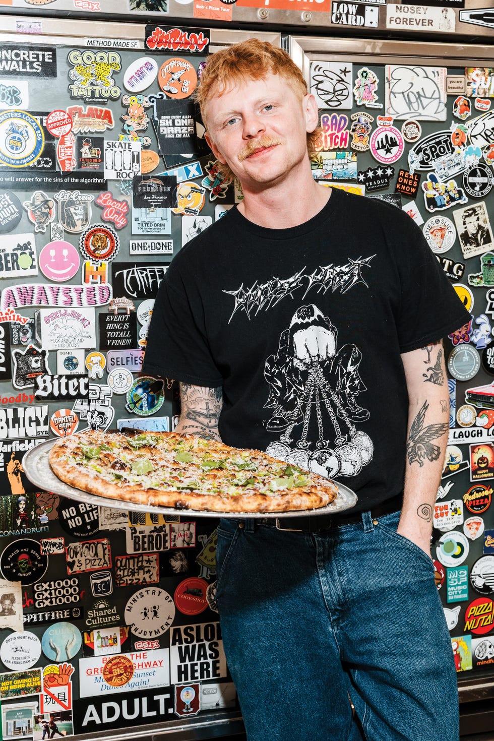 25 restaurants defining california dining, outta sight pizza, san francisco, server ev tilson holds the orchard pie