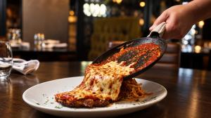 Fratelli’s Chicken Parmesan smothered in scratch made roasted garlic marinara and mozzarella cheese.
