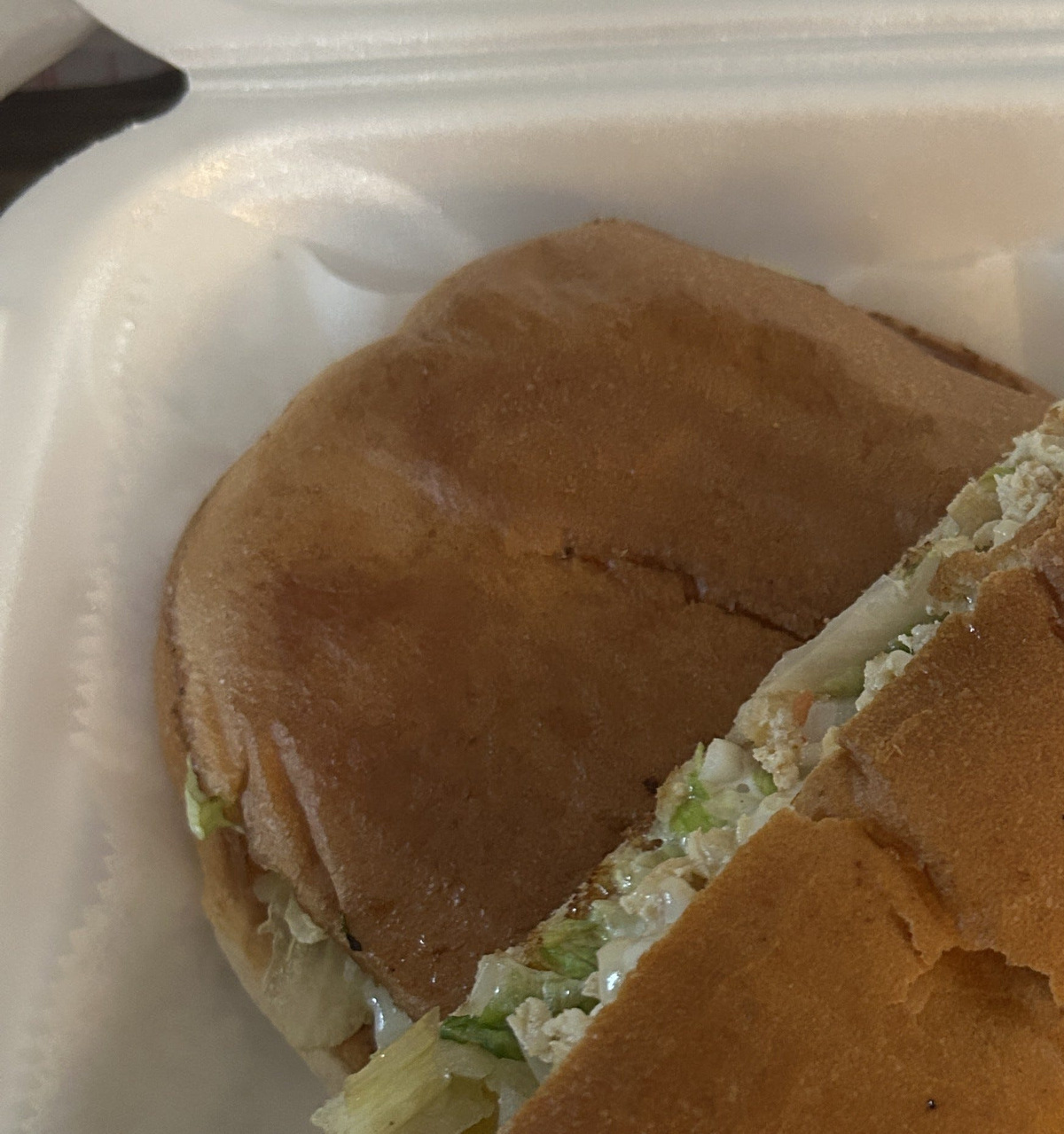 A chicken torta sandwich from Tacos El Mandi, a food truck that offers Mexican cuisine throughout the area of the South Akron neighborhood.
