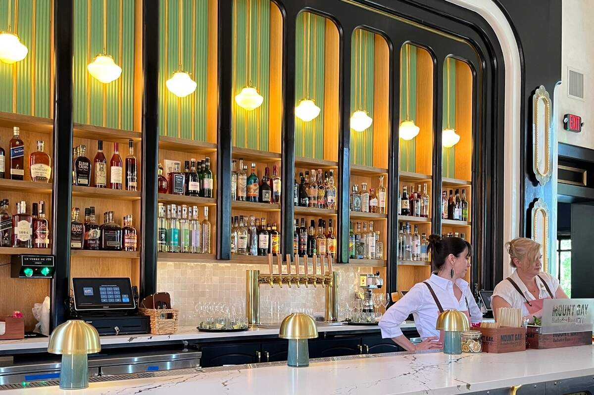 Bar manager Rhea Buck and beverage director Colleen Hughes work behind the bar at Leluia Hall.