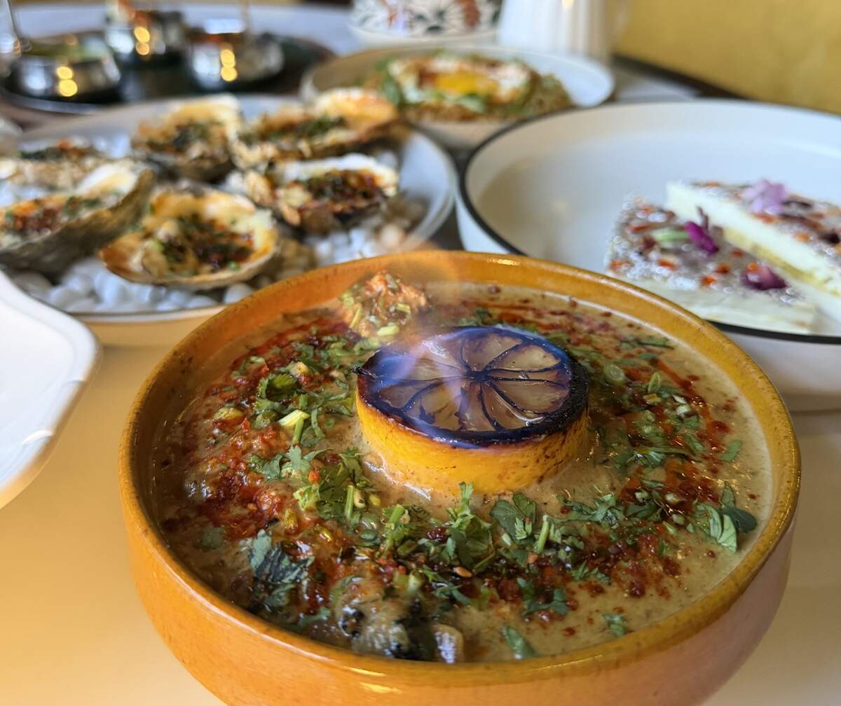 The popular Kasauli Lemon Chicken at Zamindar’s Clubhouse is Charlotte — flambed tableside — is also on the menu at chef Vamshi Krishna Adi’s Gazab restaurant in New York City.