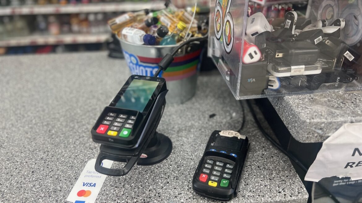 Missouri and Kansas could pay more for SNAP next year EBT card reader next to a credit card reader at a Kansas City retail location.
