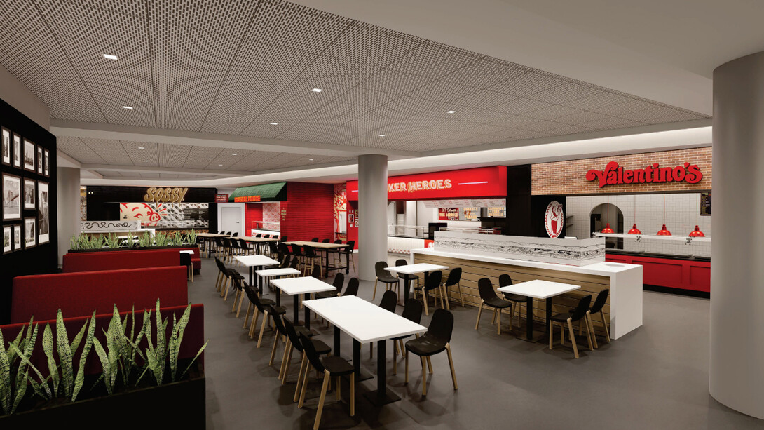 Empty tables and booths are seen in a food court with Sossy, Imperial Palace, Husker Heroes and Valentino's restaurants seen.