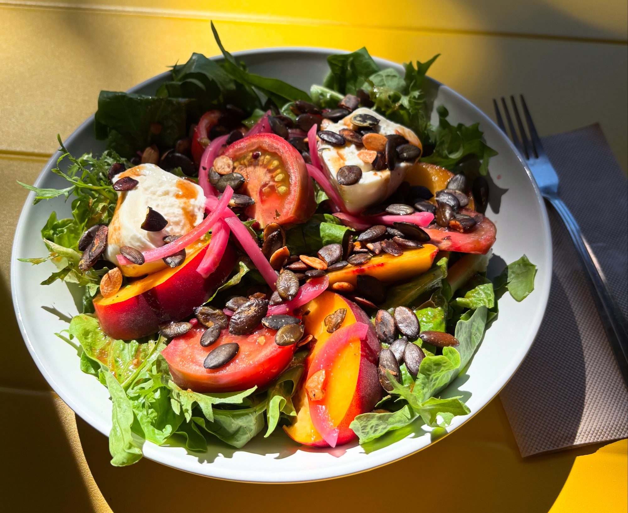 2026 Portland Salad Week Restaurant Specials: Peach Burrata Salad from Fresh Love.