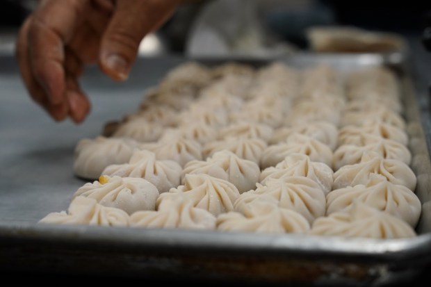 A tray of momo prepared by Madhab Shrestha of Momo Dumplings at Aurora Town Center wait to be cooked in Aurora, Colorado on Friday, April 24, 2026. (Photo by Harmon Dobson/The Denver Post)