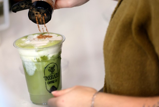 Audrey Vollmann makes a pumpkin spice matcha latte at Tarrazu Coffee Co. in Coconut Creek on Monday, Sept. 28, 2026. The family-owned shop has won best coffee in the Sun Sentinel's Best of South Florida Dining series. (Amy Beth Bennett/South Florida Sun Sentinel)