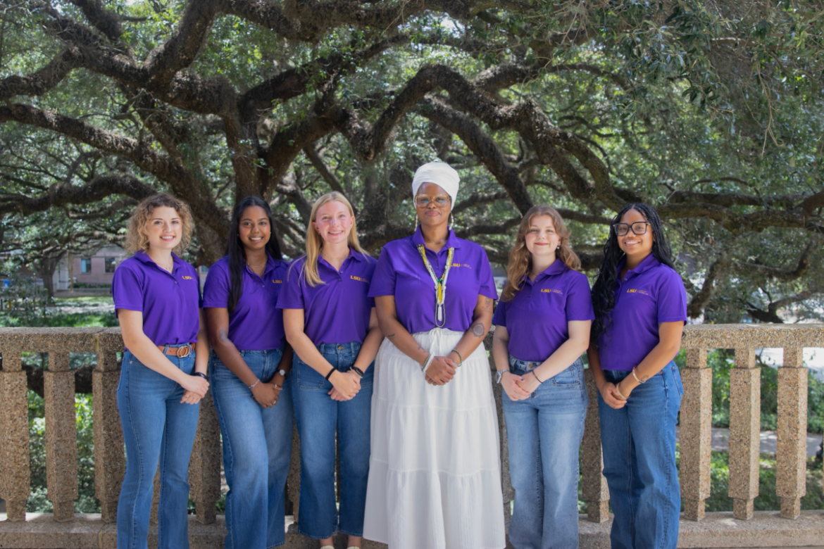 Volunteer LSU visted Texas community to help with food insecurity The Volunteer LSU executive board and staff advisor, Ifágbémisọ́lá Bámigbálà-Arẹ̀sà stans outisde the LSU Union together.