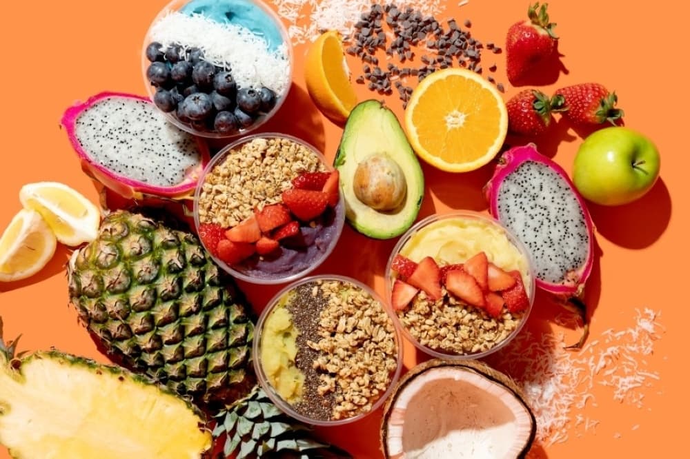 assortment of fruit and bowls