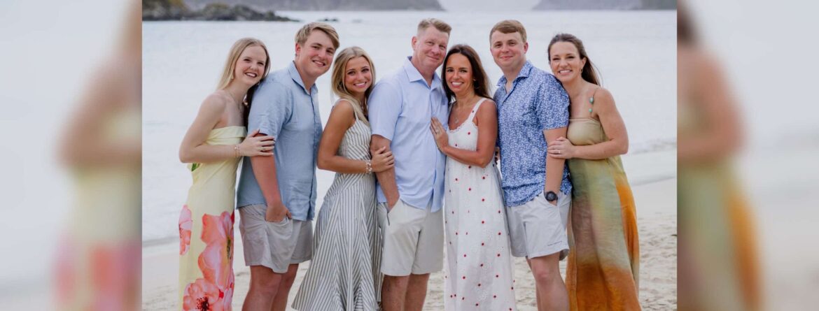 Larsen family to open Rusty’s in Oxford The Larsen family stands together on a beach, smiling in summer clothing.