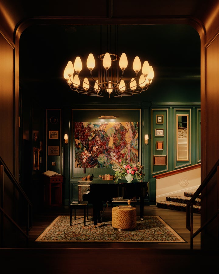 Guests are whisked up grand staircases and through secret passages into three floors of drawing rooms, parlors and lounges, each of which double as performance spaces. 