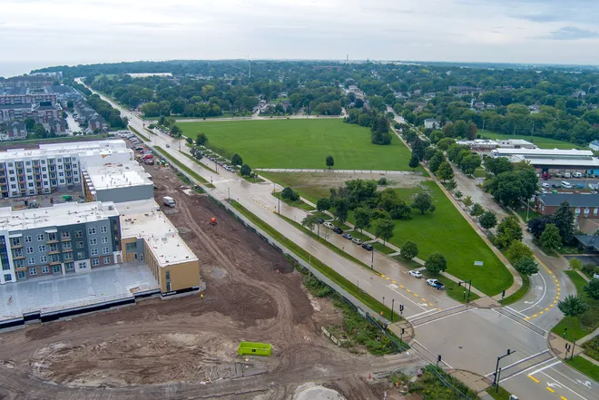 The triangle parcel of land north of East Howard Avenue, east of South Packard Avenue and west of South Lake Drive in St. Francis, Wisconsin on Sept. 9, 2026. Richfield-based Cream City Real Estate Investments has submitted a new detailed planned unit development concept for the parcel to St. Francis officials calling for apartments, a grocery store, retail and pickleball.