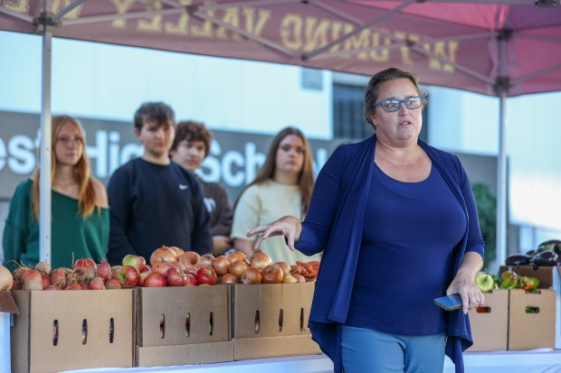 Clancy Harrison, Founder and Executive Director of Food Dignity, speaks during the opening of a produce stand in conjunction with a farm-to-school partnership between The Food Dignity and Wyoming Valley West School District on Thursday, Oct. 15, 2026. JASON ARDAN / STAFF PHOTOGRAPHER
