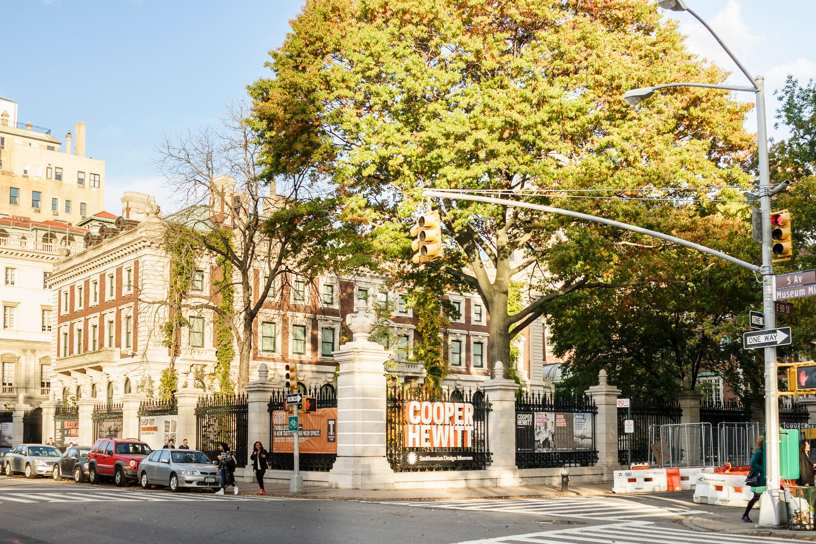 Image may contain City Urban Neighborhood Road Street Architecture Building Downtown Person Autumn and Car