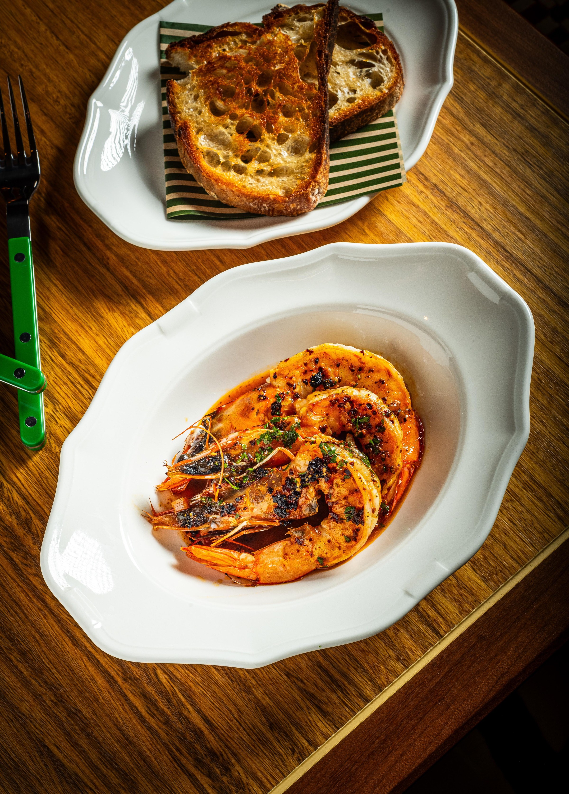 Head-on Gulf prawns with beurre monte and Delfino cilantro were a crowd-pleaser during a Bar Nuestro preview at Navy Yard’s Oyster Wars over the weekend.
