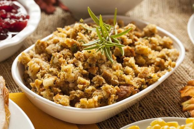 STUFFING | Thanksgiving dinner takes a lot of labor, and there are plenty of dishes you can make ahead and freeze, but stuffing isn't one of them. If you want, you can make the dry ingredients and wet ingredients separately, but do not mix them until you're ready to put them in the turkey or into a casserole, or else the dish will be susceptible to bacterial growth.