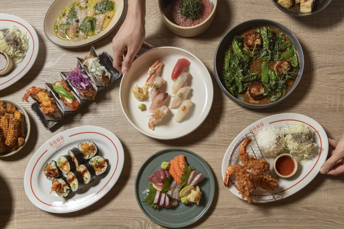 assortment of sushi and other japanese dishes