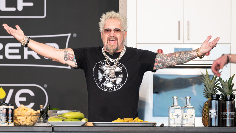 Guy Fieri at a cooking demonstration