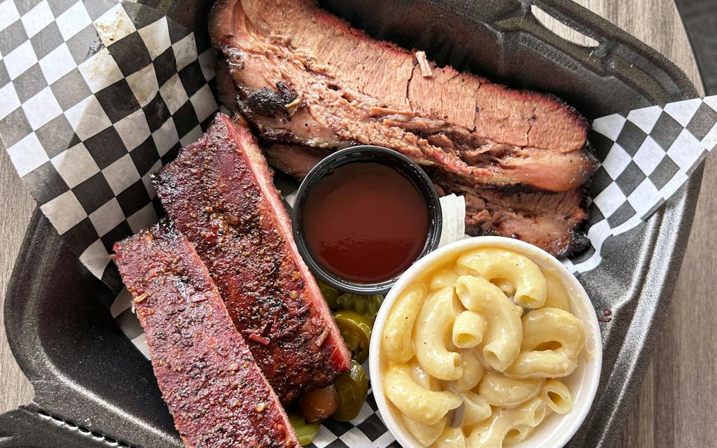 overhead photo of brisket, ribs, and mac and cheese