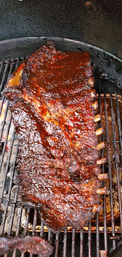 Tried smoking ribs for the first time in my charcoal grill! I am shocked at how amazing they taste! Credit to my wife for the dry rub she made for them.