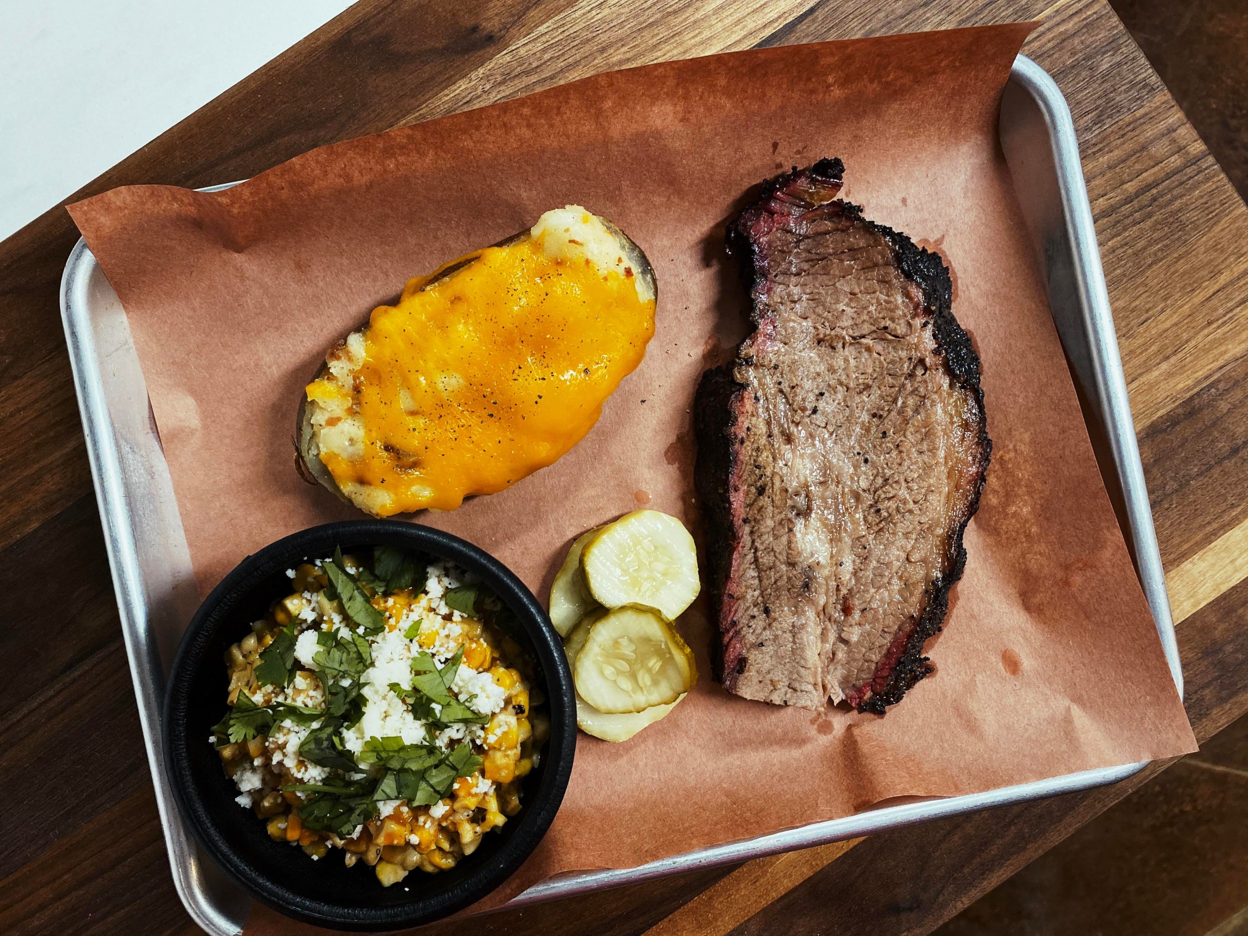 Fatty smoked brisket. Elote. Twice baked potato. Dining and Cooking