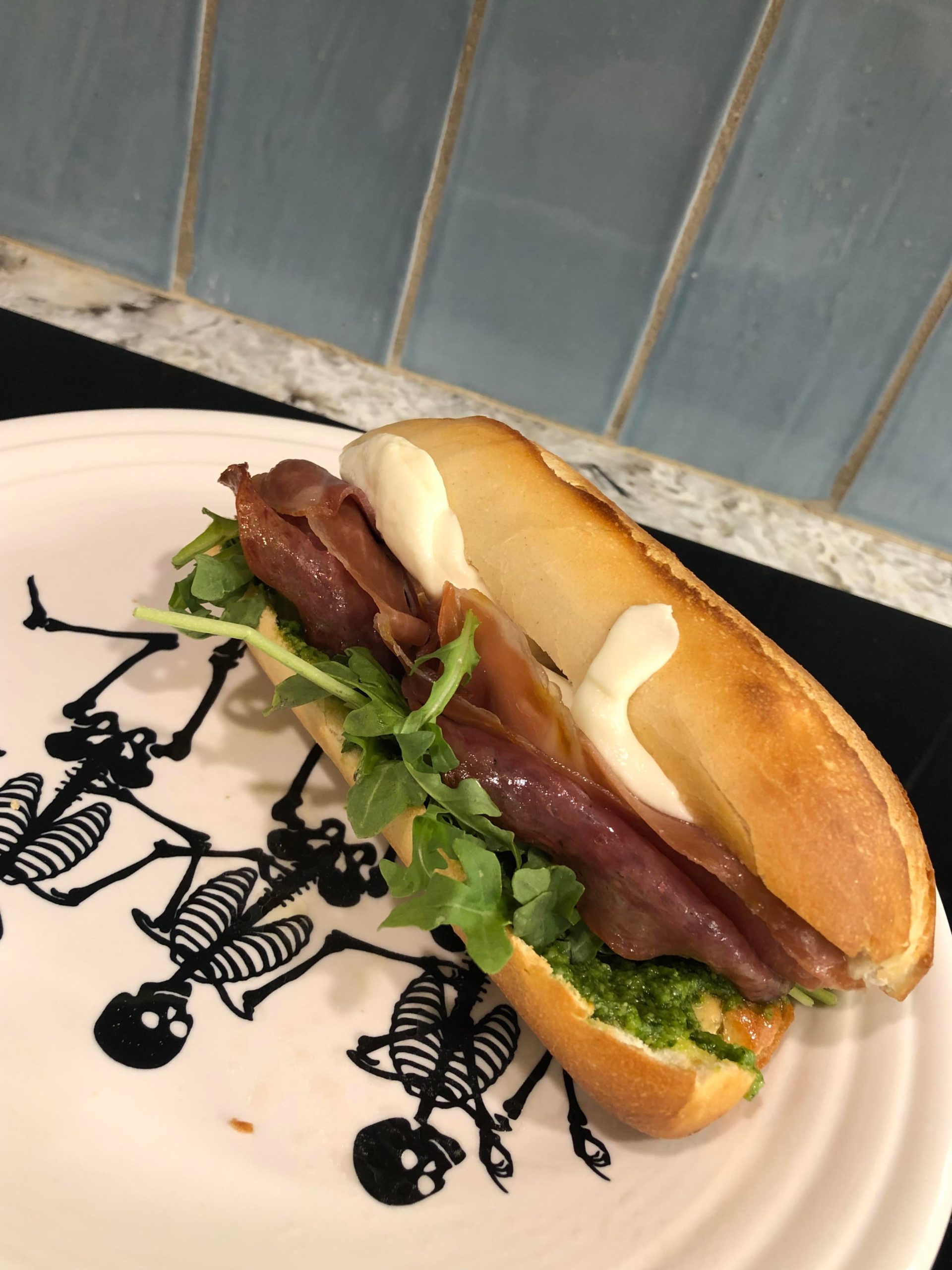 Prosciutto, salami, arugula, mozzarella, balsamic vinegar, and fresh