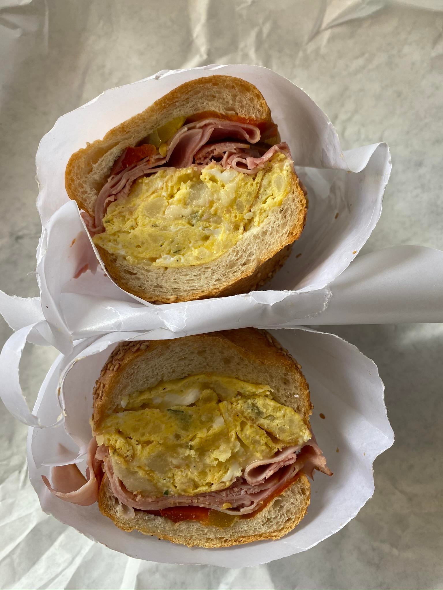 Potato, egg, and cheese with hot peppers and ham. Defonte’s, Brooklyn