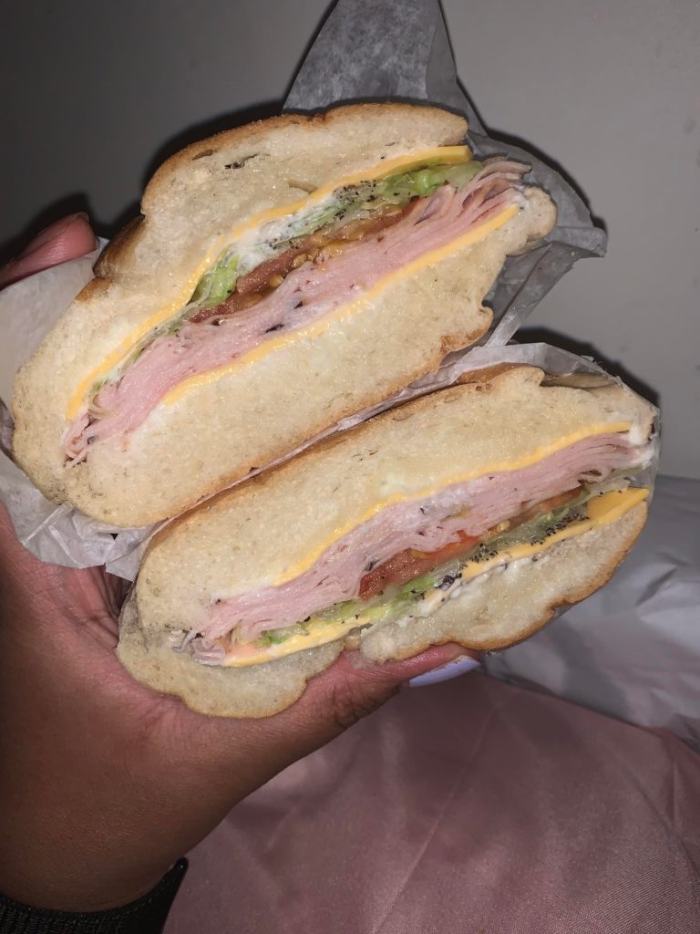 A honey turkey on a roll with everything on it from my favorite deli