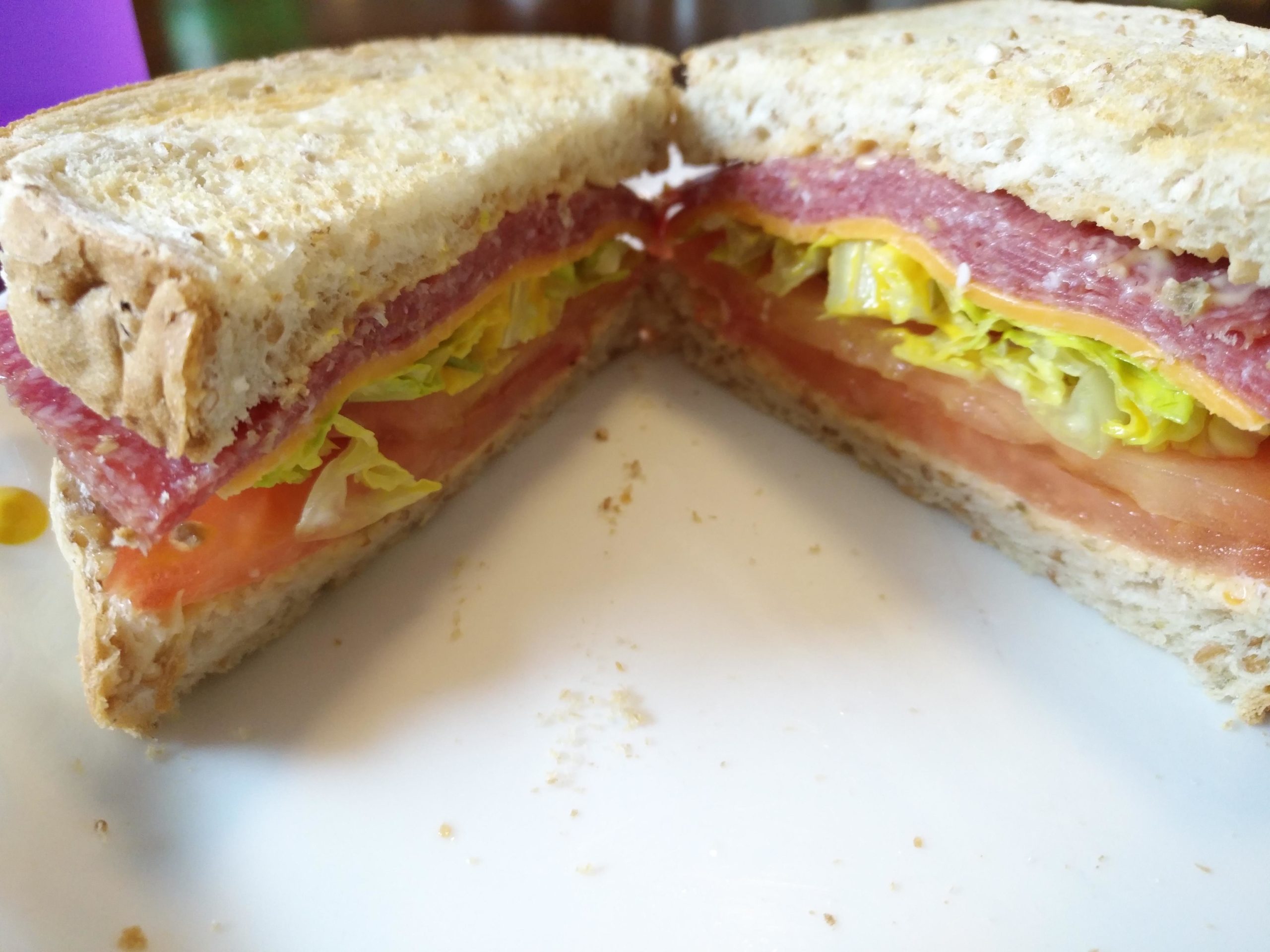 Mustard seed salami, cheddar, lettuce, mustard and tomato. Dining and