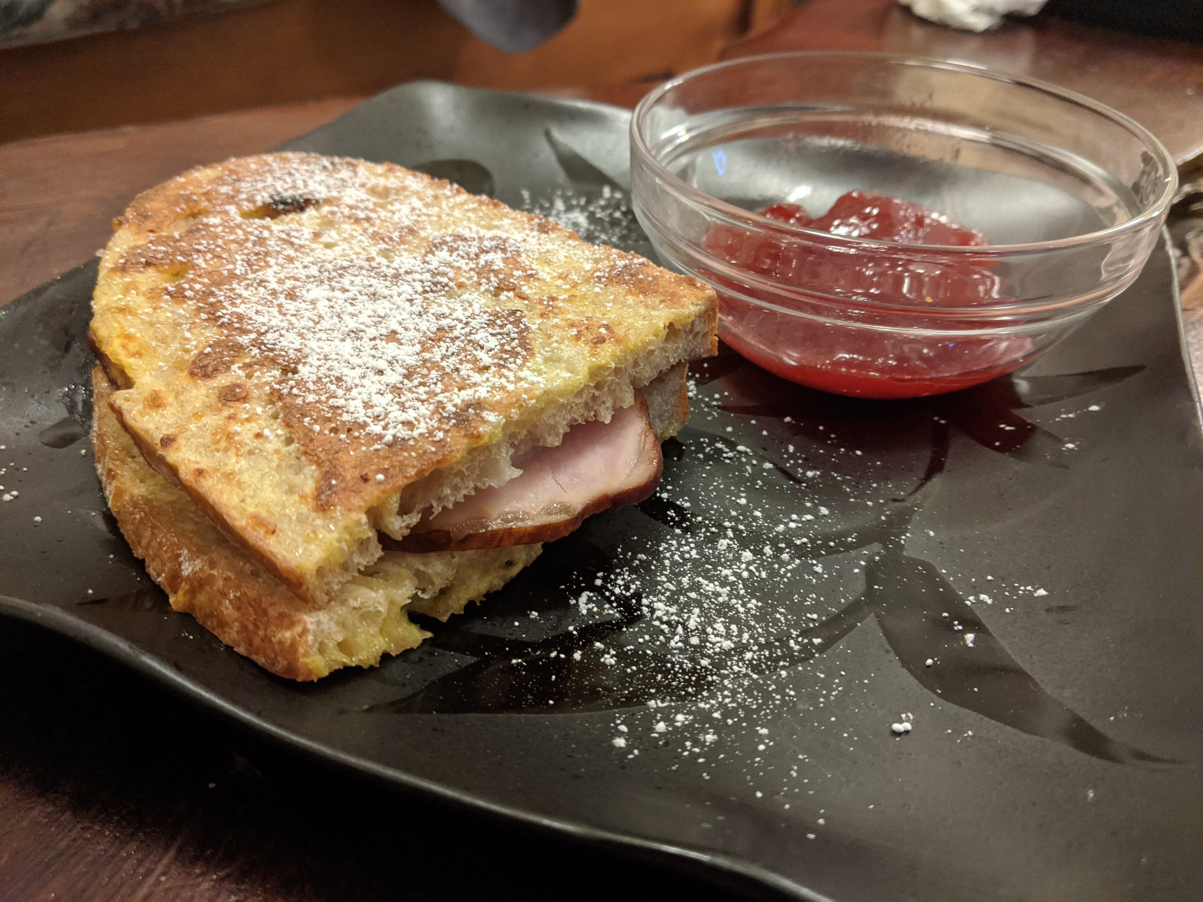 Monte Cristo sandwich on homemade sourdough with strawberry jam