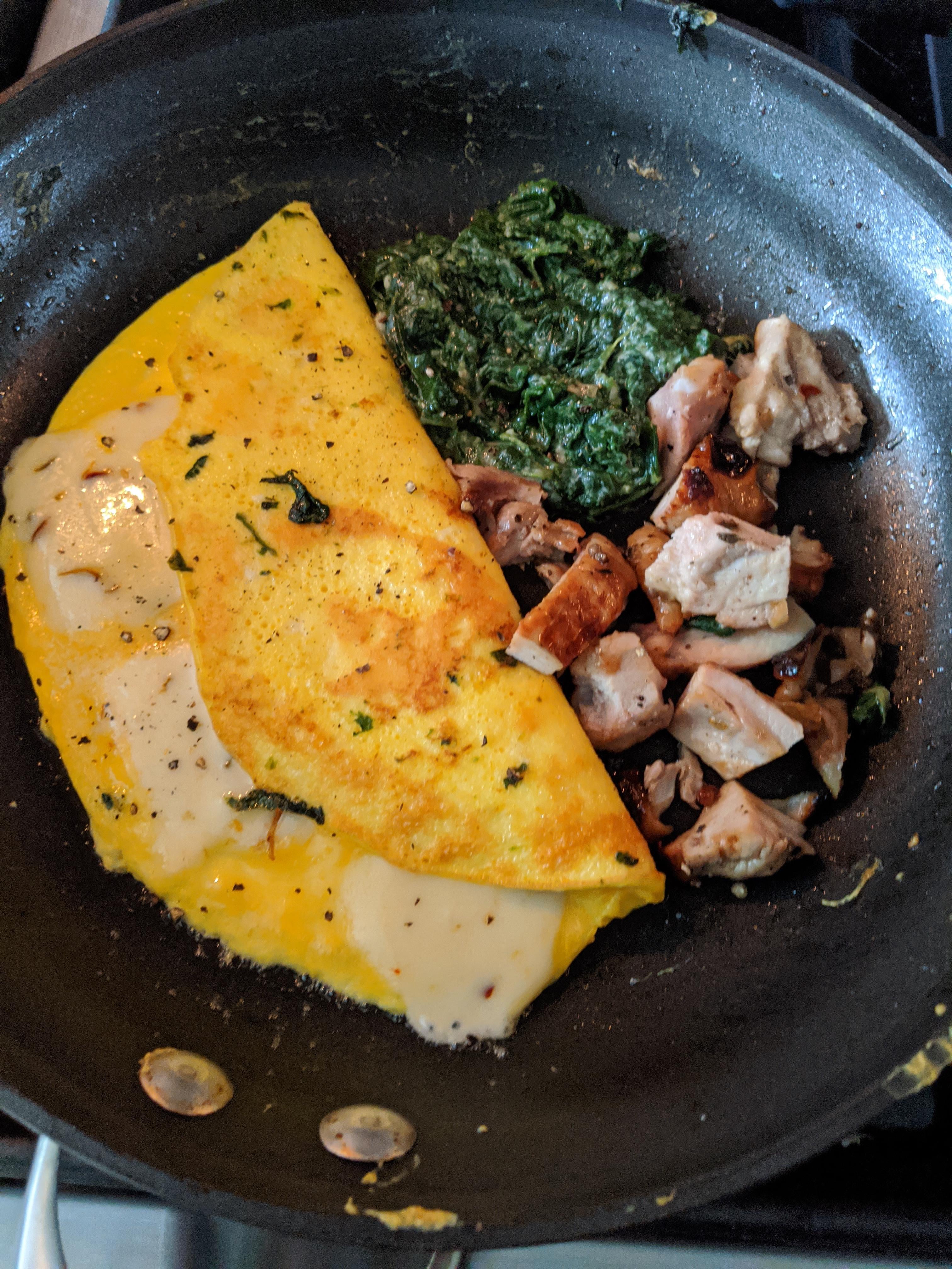 Homemade pepper jack omelette with spinach florentine and mesquite