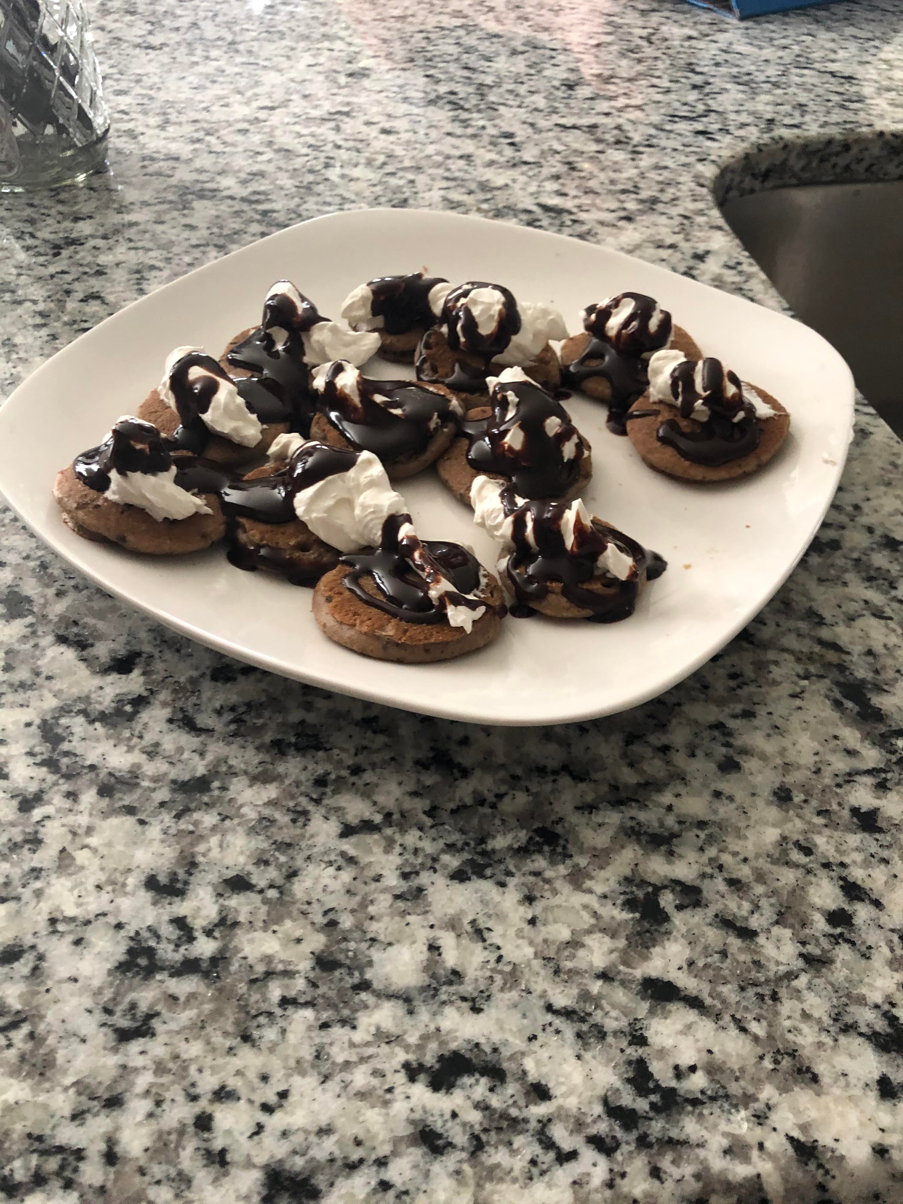 Eggo mini chocolate chip pancakes with whipped cream and Hershey’s