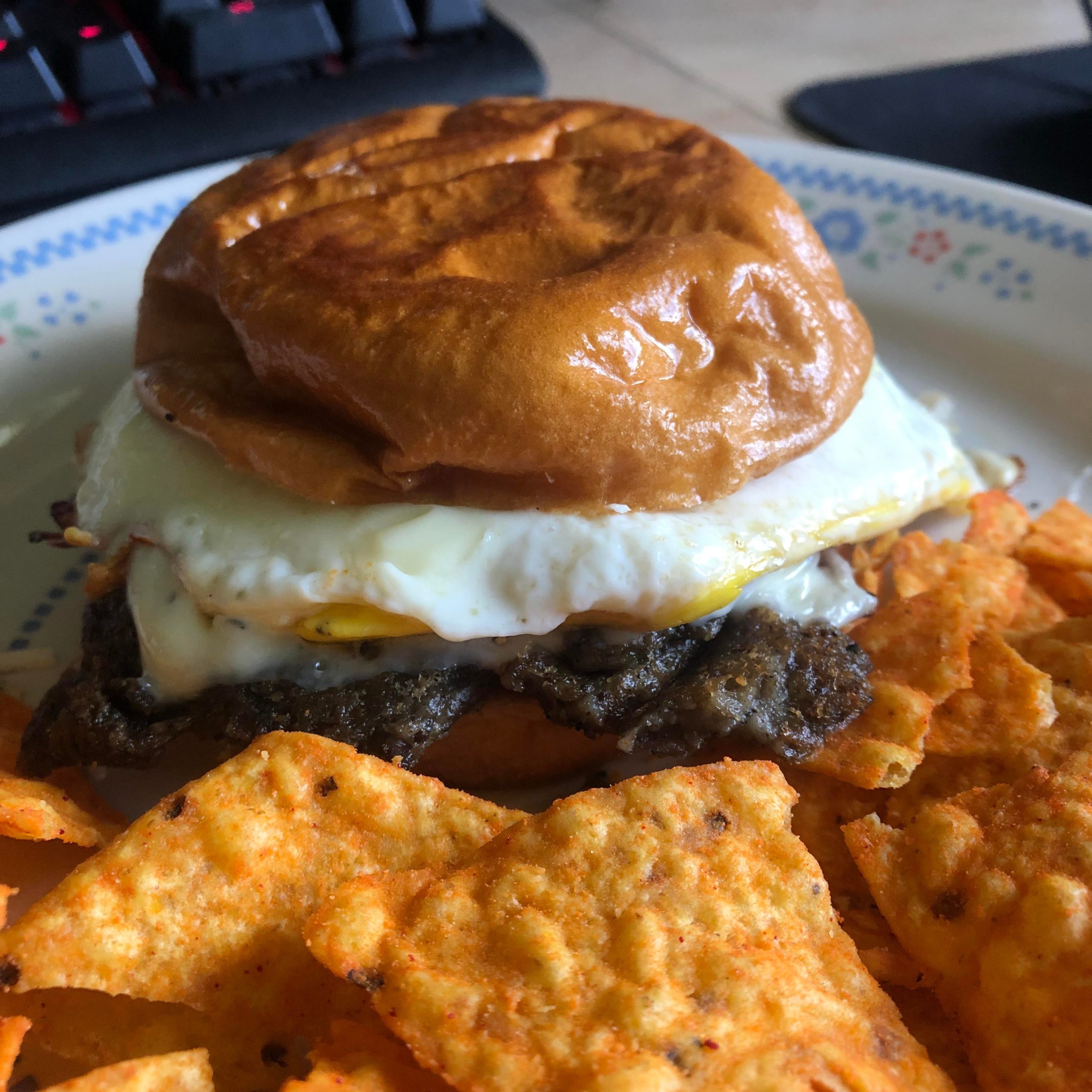 Scrapple, egg, white American, and everything bagel seasoning on a