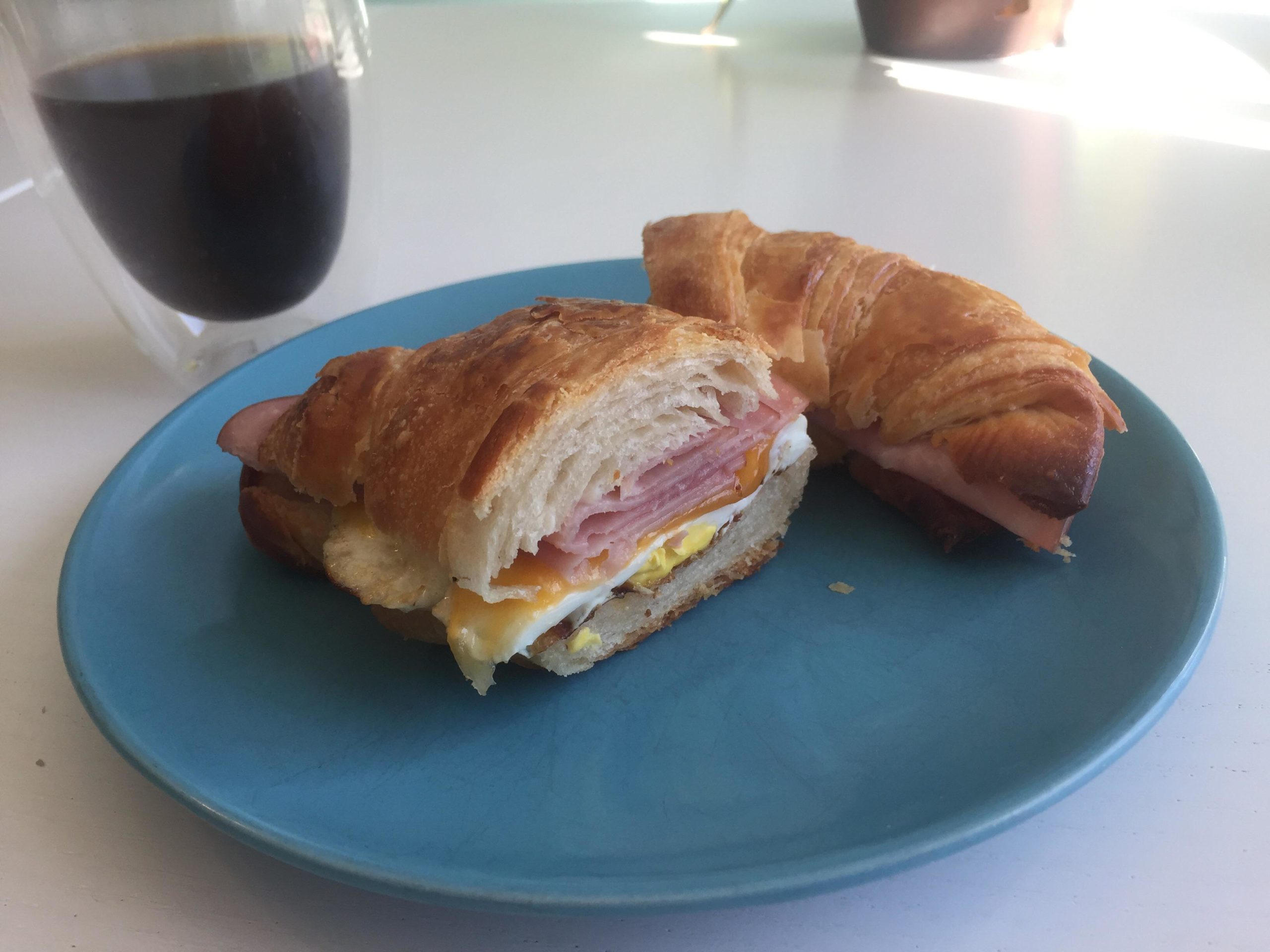 Egg, ham, and cheese sandwich on a homemade sourdough croissant. 👌 Dining and Cooking