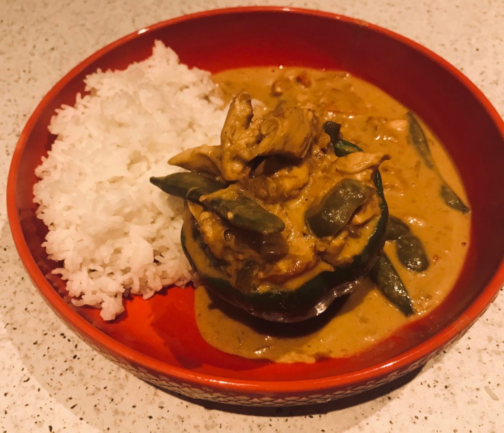 Homemade Thai green curry served in a roasted green pepper