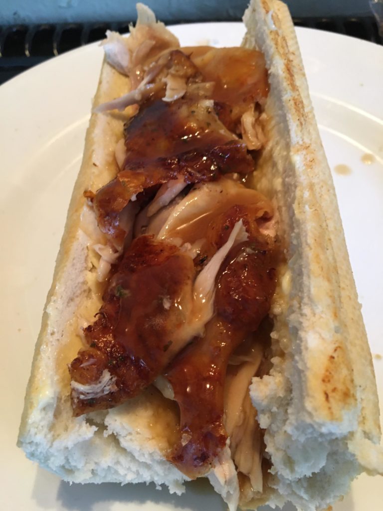 Roast chicken baguette with chicken gravy with chicken juices