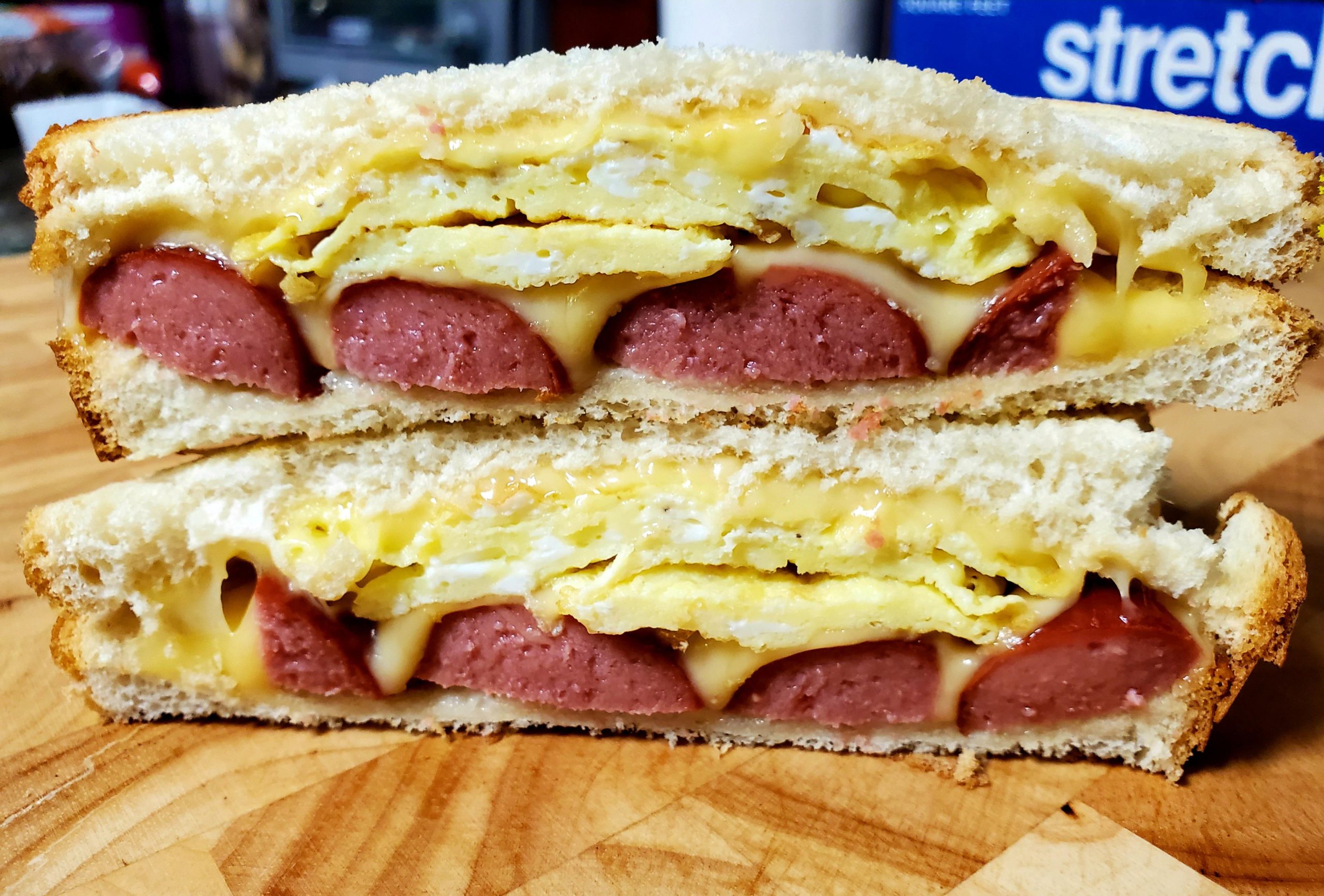 Nathans Hot Dog, Egg, Gouda Cheese Breakfast Sandwich Dining and Cooking