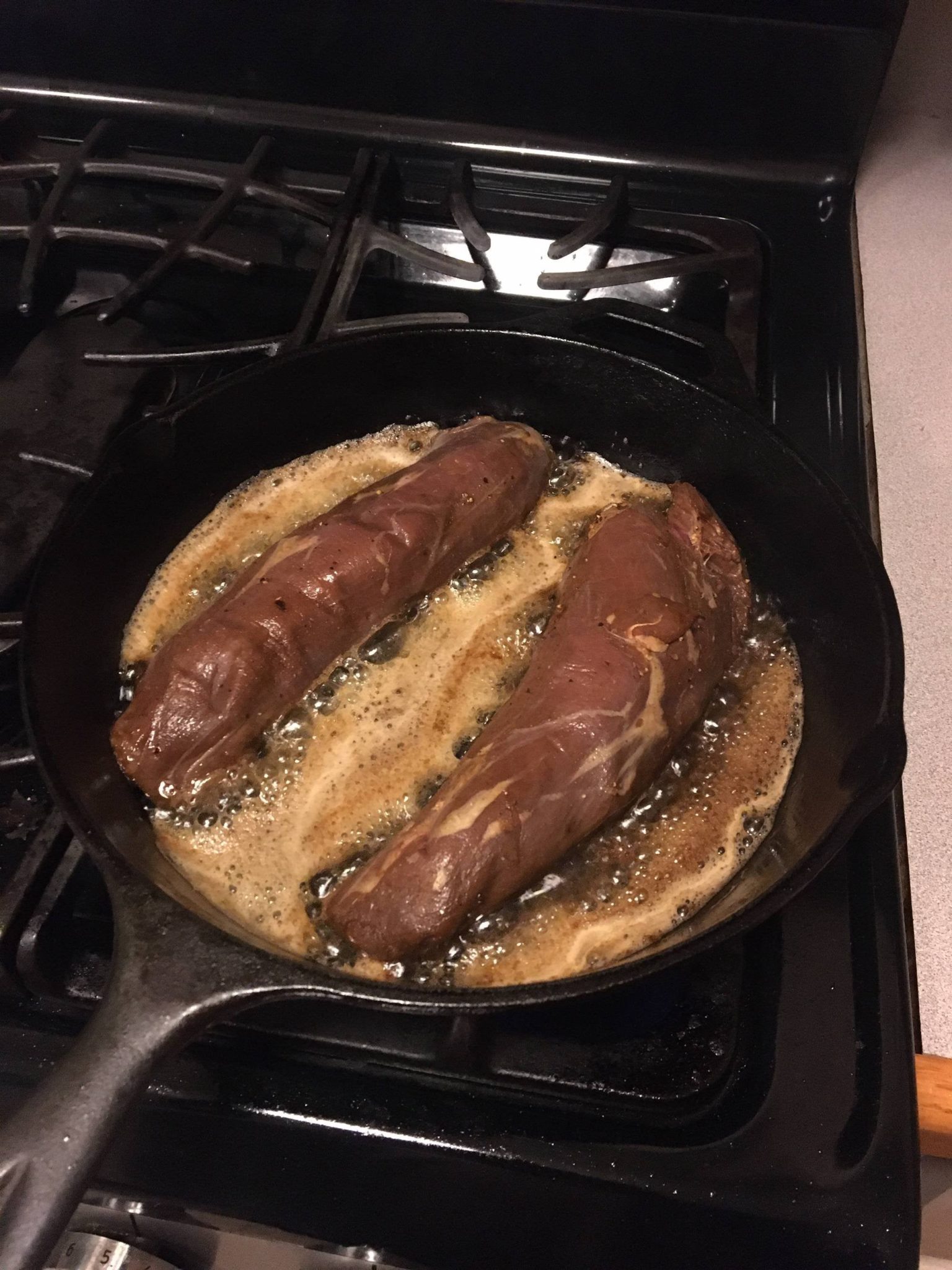 Dry brined over night, then cooked in duck fat, rosemary, and garlic