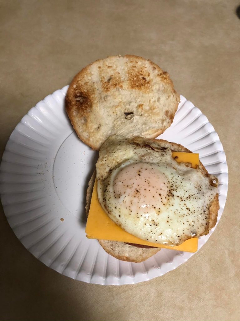 Pork roll, fried egg and cheese on a toasted kaiser roll with an ‘Irish’ iced coffee.