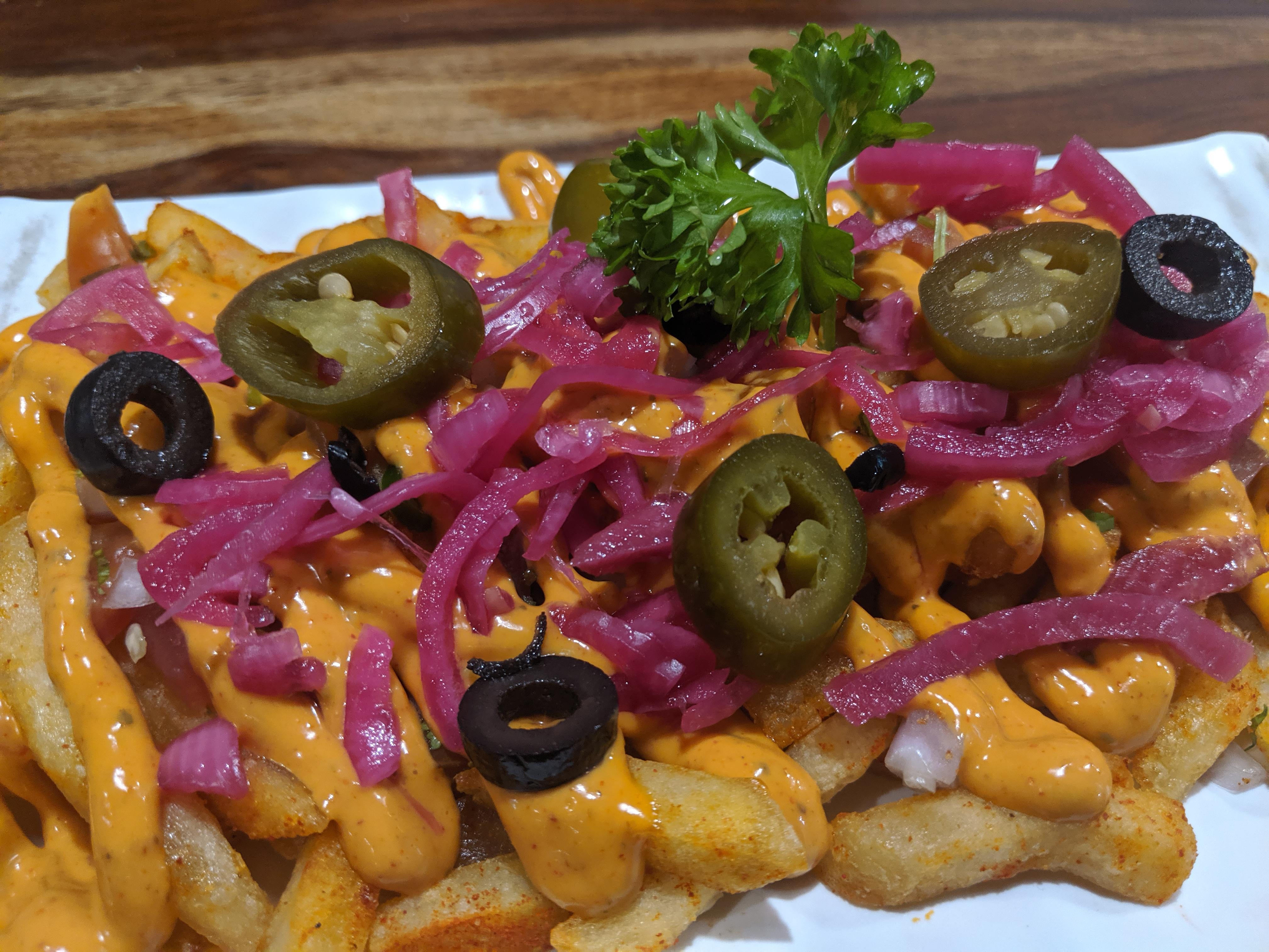 PeriPeri fries loaded with chipotle sauce Dining and Cooking