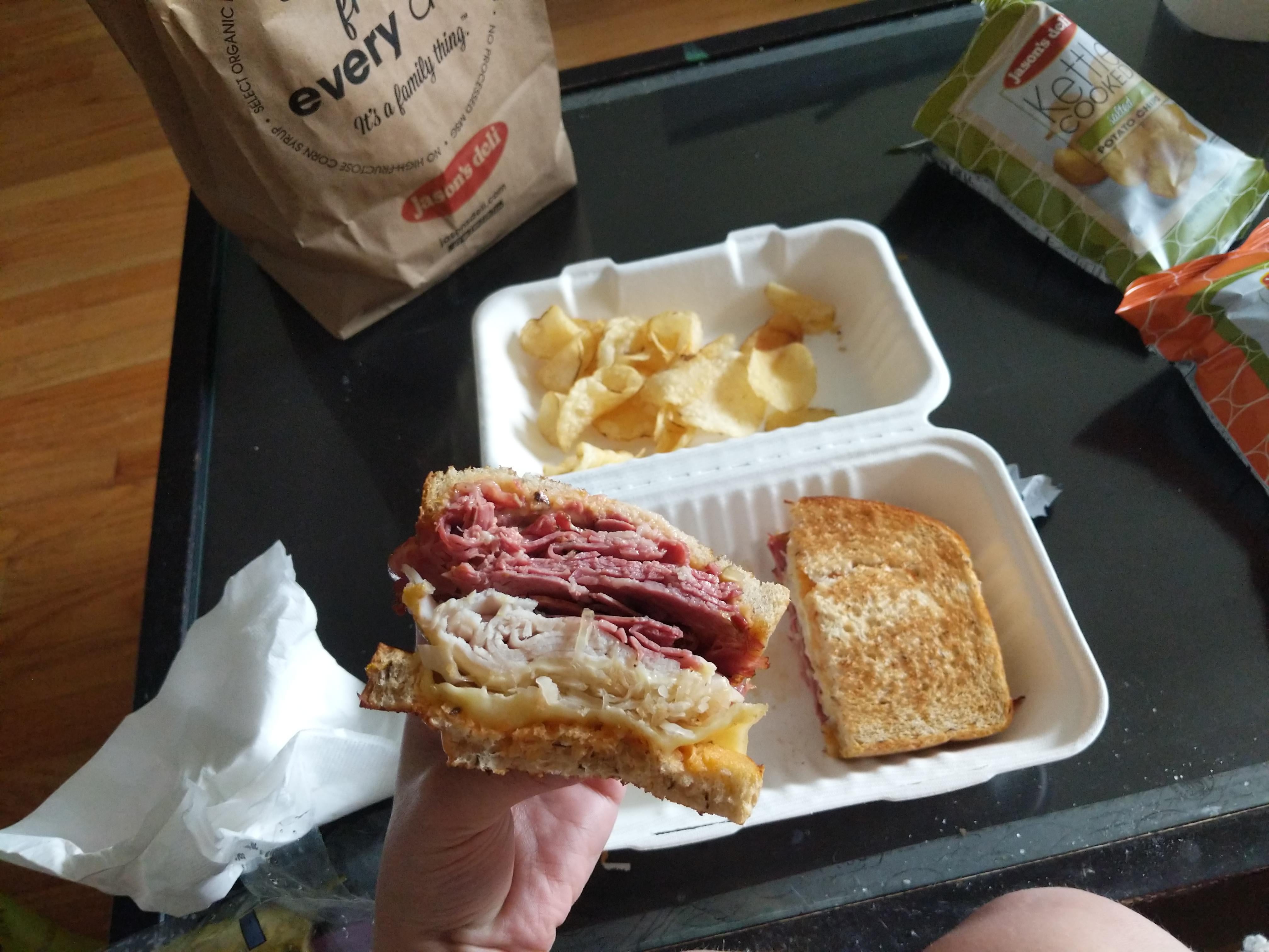 Classic Rachel sub with pastrami , turkey, Swiss and sauerkraut. Dining and Cooking