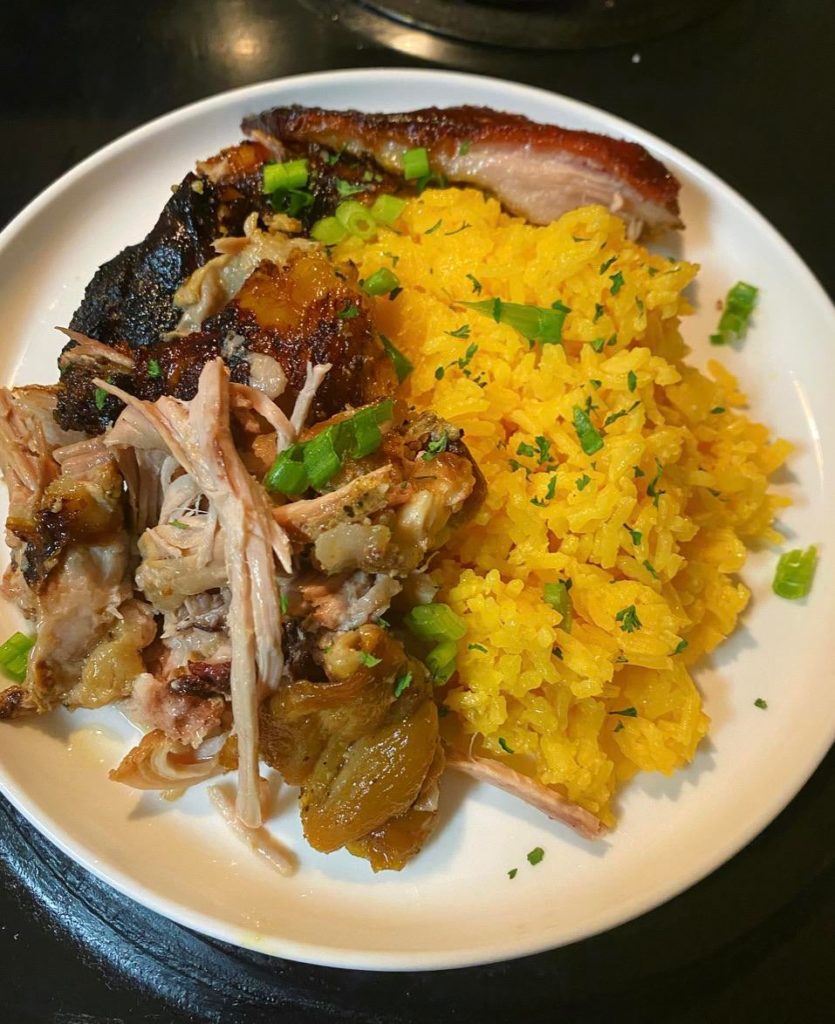 Pernil (Dominican Roast Pork) and Yellow Rice, would recommend! ✨🥘😋